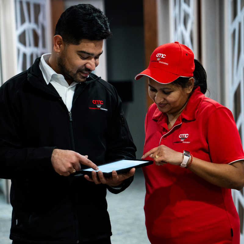 Site Supervisor, Customer Service Manager reviewing cleaning standards with cleaner on site 
